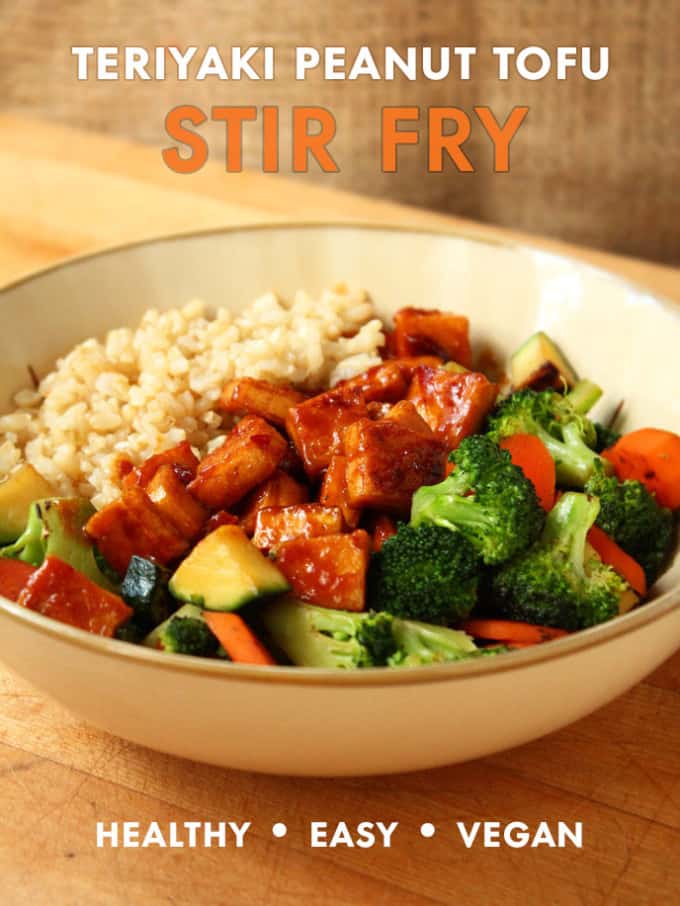 A bowl of Teriyaki Peanut Tofu with Stir-Fried Veggies & Brown Rice.