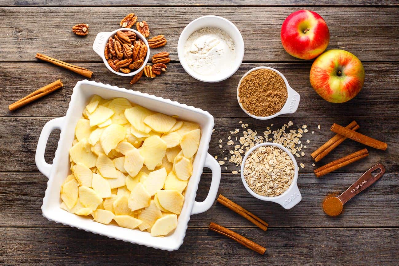 Key ingredients for making vegan apple crisp.