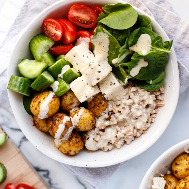 Vegan Mediterranean Bowl on a marble countertop.